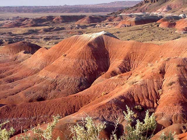 Sunset colors over the desert badlands of the Painted Desert